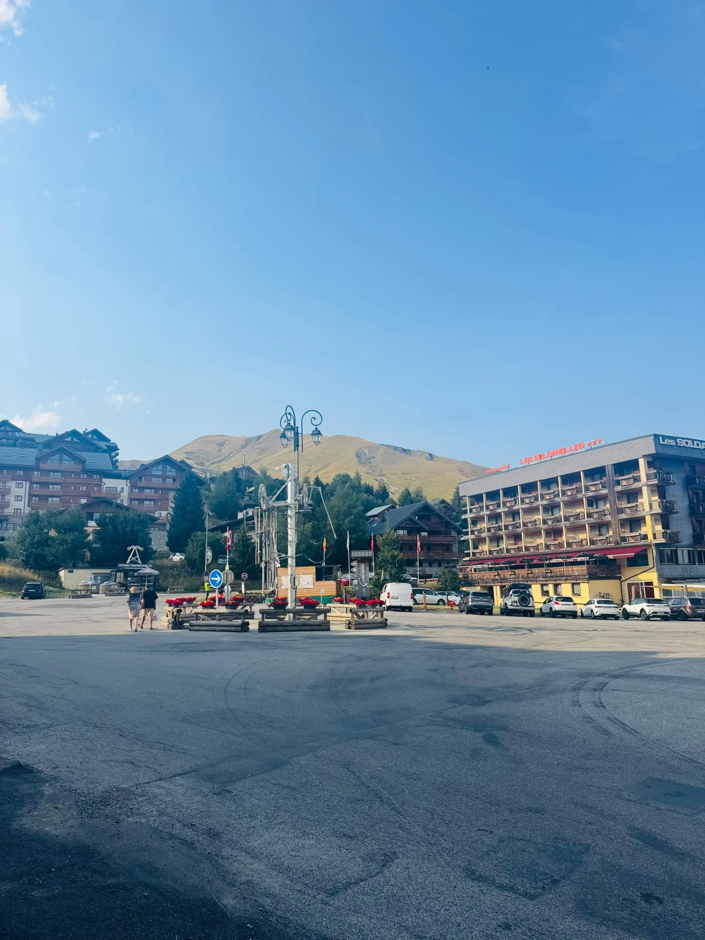 Mountain village square with hotels in the South of France